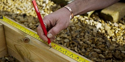 8.Measuring_timber.jpeg