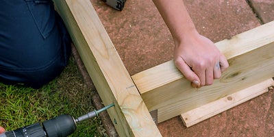 33-How-To-Lay-A-Deck-Adding-Internal-Joists-Step-7.jpeg