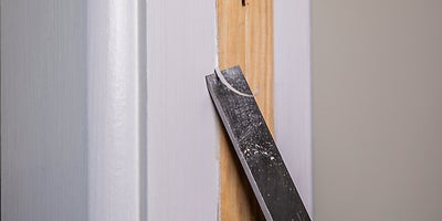 17.How-To-Fix-Door-Problems-Moving-Doorstop.jpeg