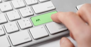 fingers pressing "API" key on keyboard