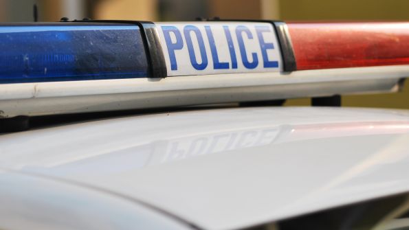 Police care with emergency lights