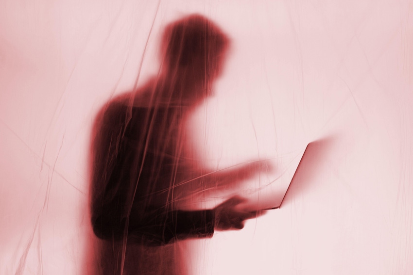 image of man's shadow behind a curtain