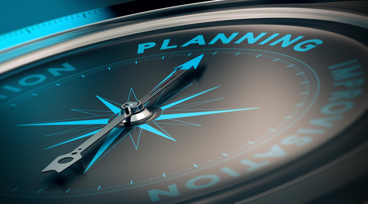 compass with needle pointing the word planning compass with needle pointing the word planning