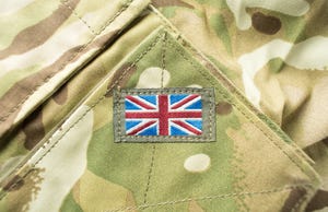union jack : union flag badge on a camouflage british army uniform