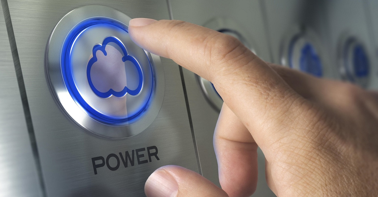 finger pressing "cloud" button finger pressing "cloud" button