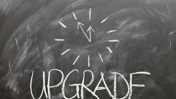 upgrade written in chalk on blackboard