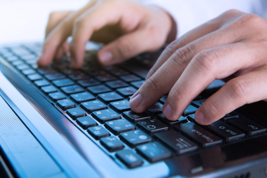 hands typing on laptop keyboard hands typing on laptop keyboard