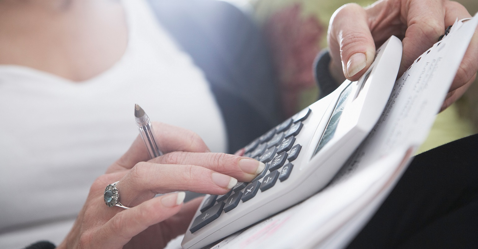 woman using a calculator