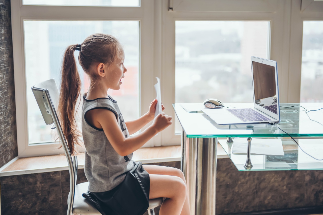 child during an online class troubleshooting remote learning tools child during an online class troubleshooting remote learning tools