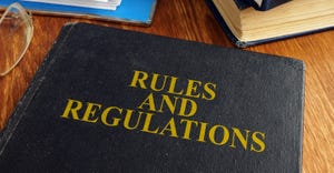 Rules and regulations book on a desk
