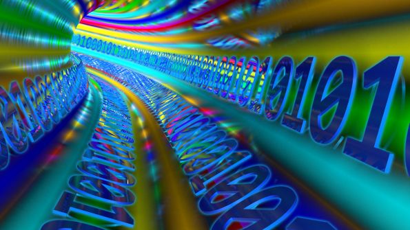 multicolored tunnel curving to the left lined with binary