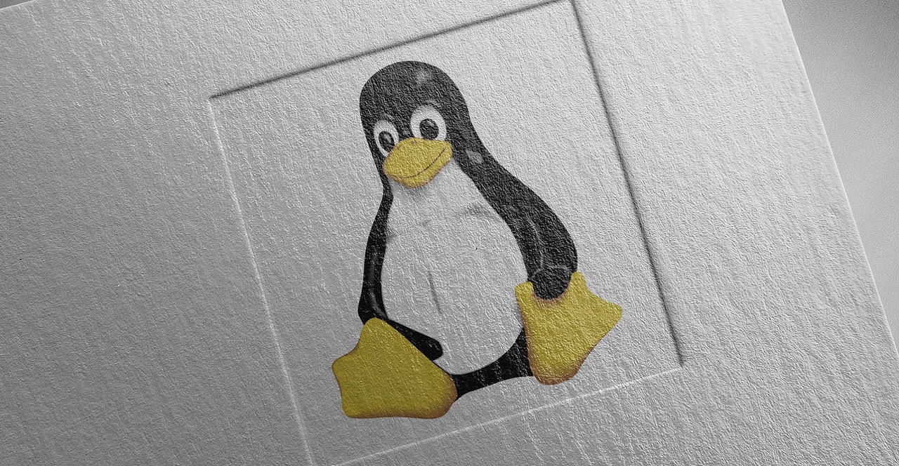 Linux Tux penguin logo on paper Linux Tux penguin logo on paper