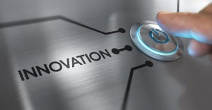 finger pressing an "innovation" button
