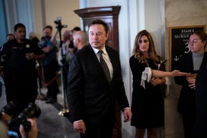 Musk arrives for the Senate forum
