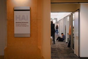 A student works in hallway at Stanford University