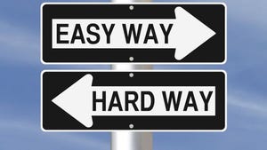 two black and white road signs pointing opposite reading EASY WAY and HARD WAY two black and white road signs pointing opposite reading EASY WAY and HARD WAY