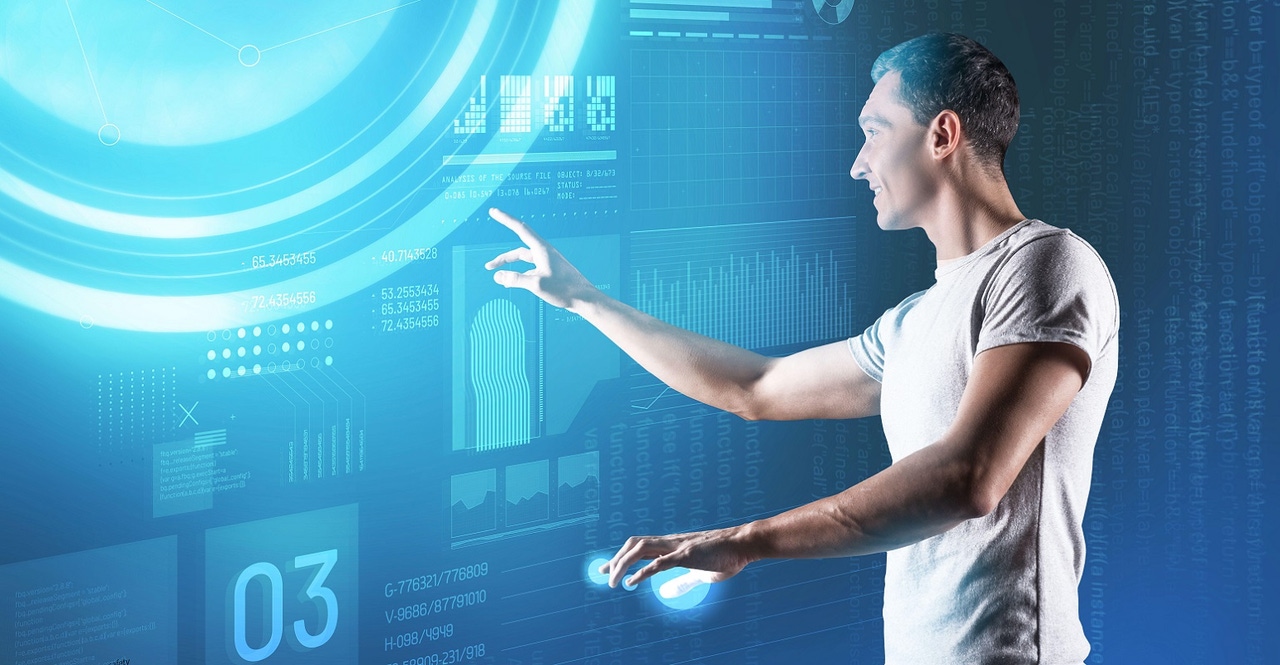 data scientist working with a large touchscreen data scientist working with a large touchscreen