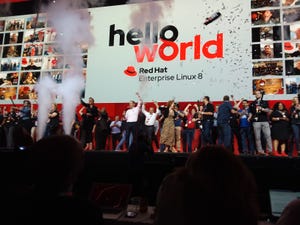 Stage full of people celebrating launch of RHEL 8 at Red Hat Summit 2019 Stage full of people celebrating launch of RHEL 8 at Red Hat Summit 2019