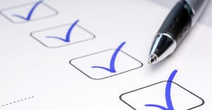 checklist checked off with pen checklist checked off with pen