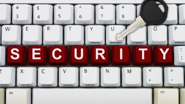 white keyboard with red keys spelling SECURITY white keyboard with red keys spelling SECURITY