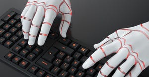 robot typing on keyboard