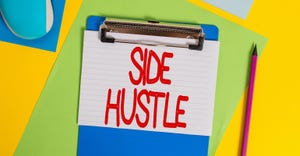 note pad with "side hustle" on it