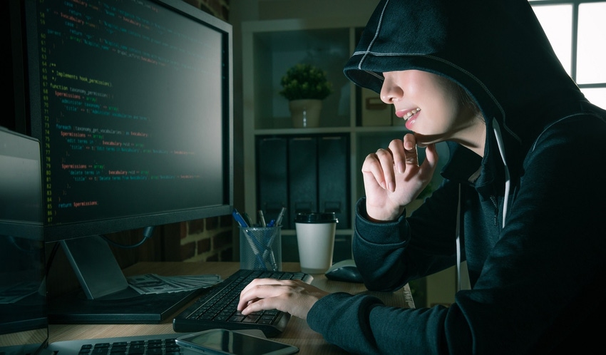 Female programmer wearing a hoodie