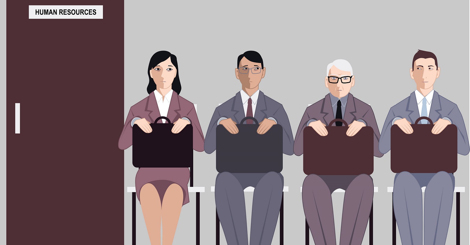 elderly man sitting in line to interview for a job