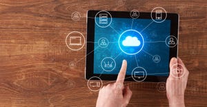 Hand touching tablet with cloud computing and online storage concept Hand touching tablet with cloud computing and online storage concept