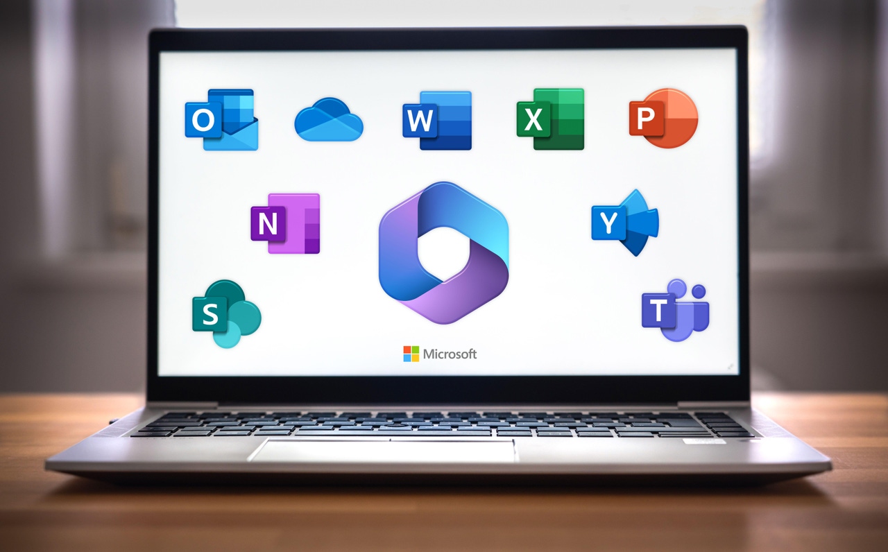 Microsoft 365 office software product and Copilot displayed on laptop Microsoft 365 office software product and Copilot displayed on laptop