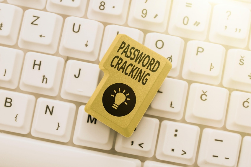 Text caption presenting Password Cracking on a button on top of a keyboard Text caption presenting Password Cracking on a button on top of a keyboard