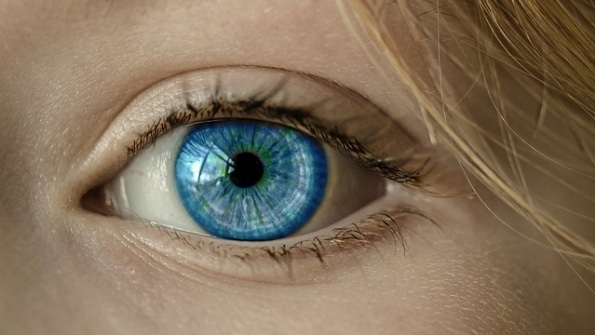 Woman's blue eye closeup Woman's blue eye closeup