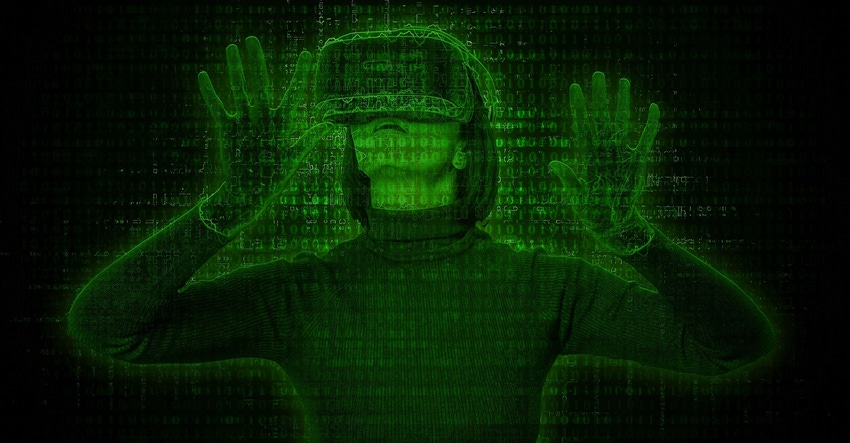 woman wearing VR goggles with green background