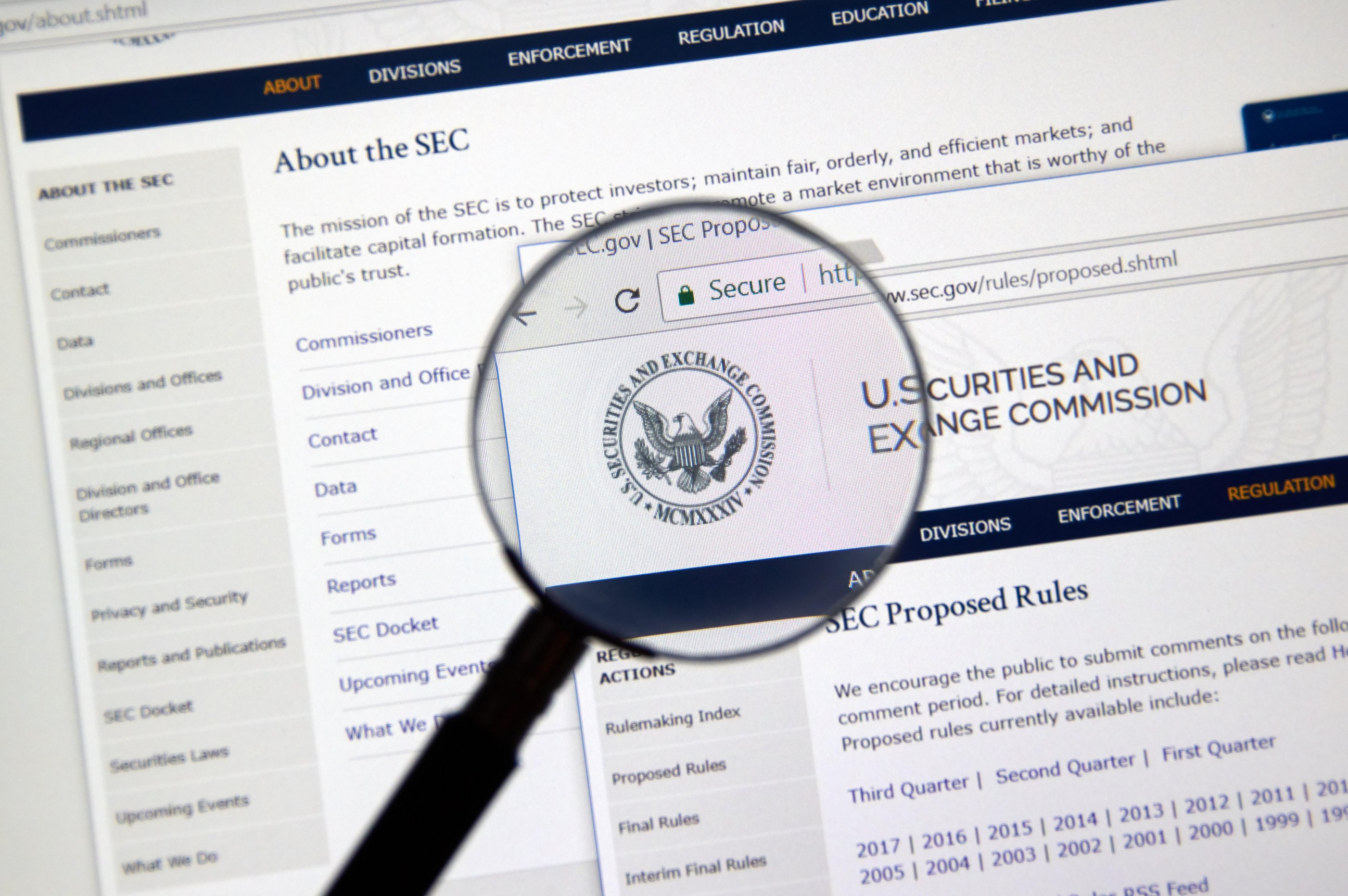 SEC webpage under magnifying glass