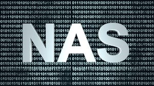 NAS written in 3D text against a binary code background NAS written in 3D text against a binary code background