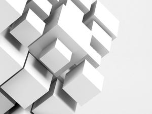 Abstract white installation of random sized cubes over light gray background