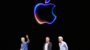 the Apple logo on stage at Apple event