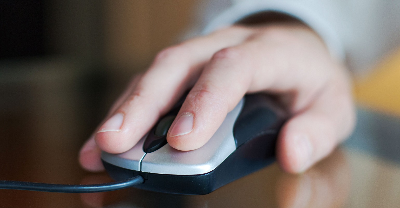 hand on a computer mouse