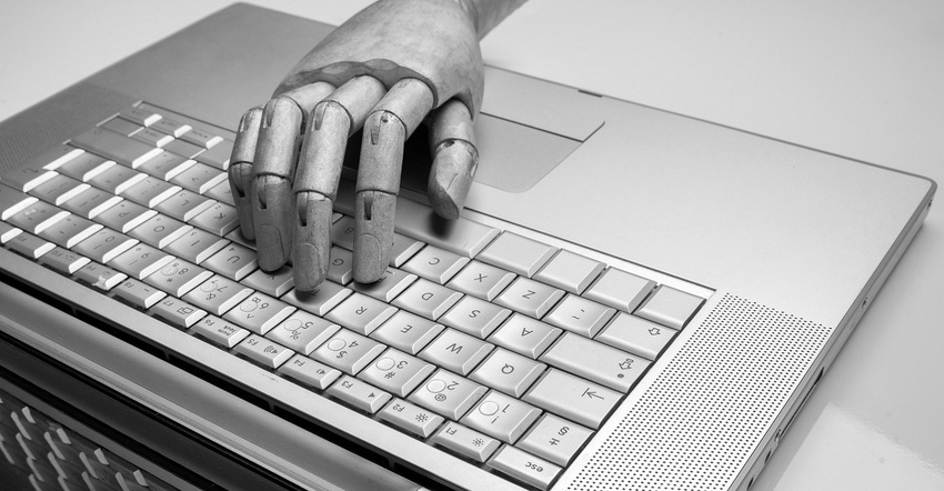 robot hand typing on keyboard