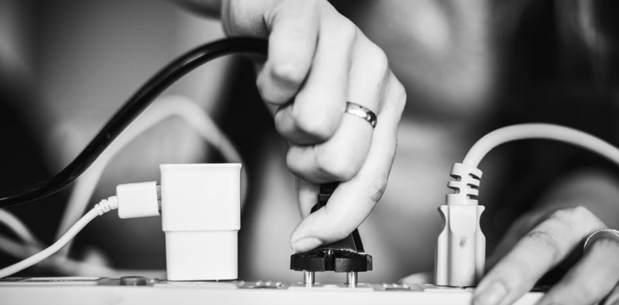 Person plugging in devices