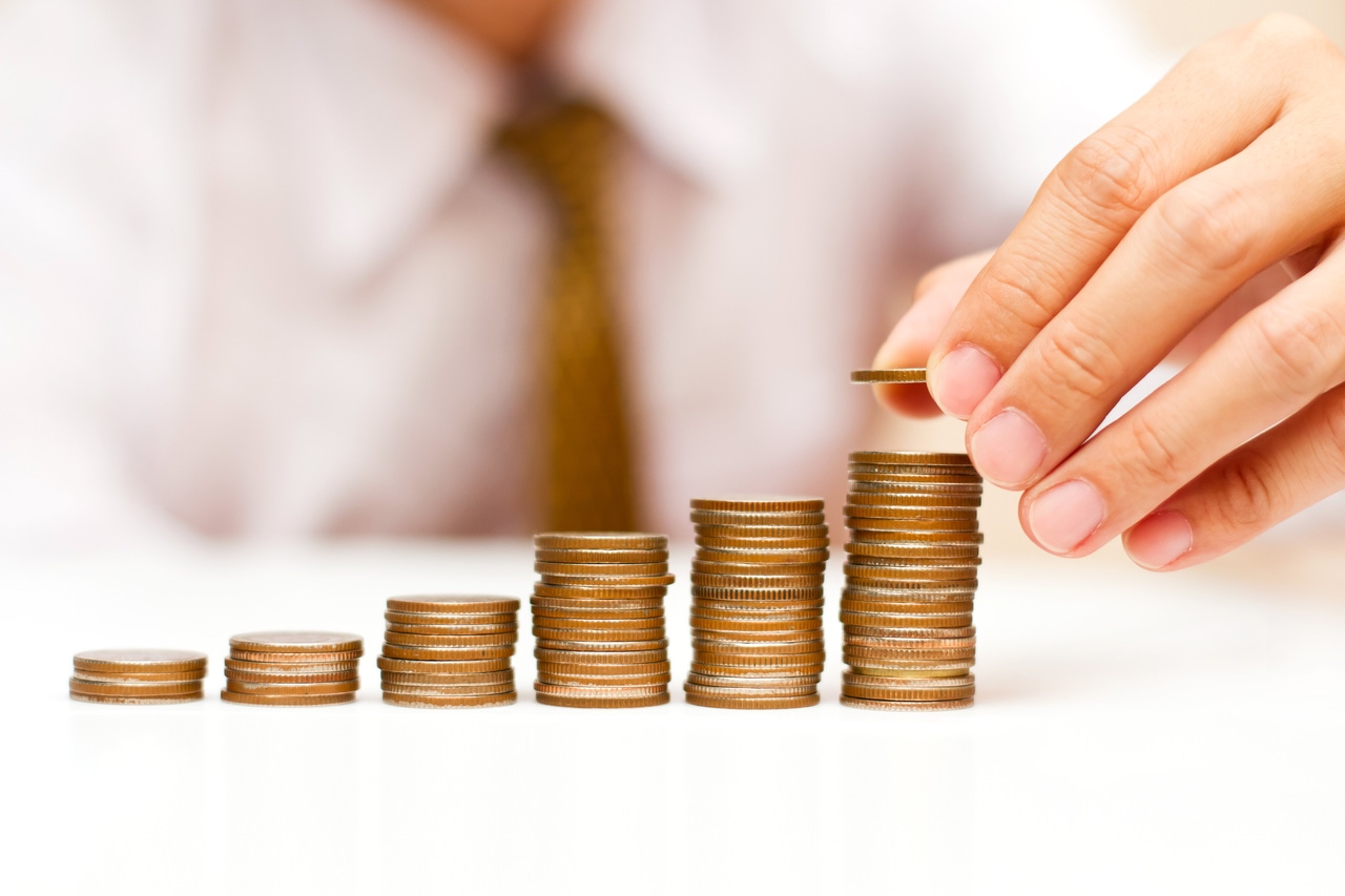 businessman stacking coins money businessman stacking coins money