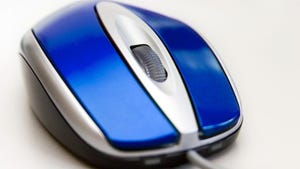 Blue computer mouse with scroll wheel