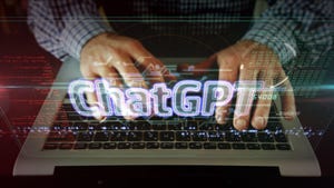 ChatGPT text over keyboard and hands typing