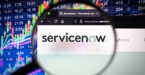 magnifying glass hovering over ServiceNow homepage