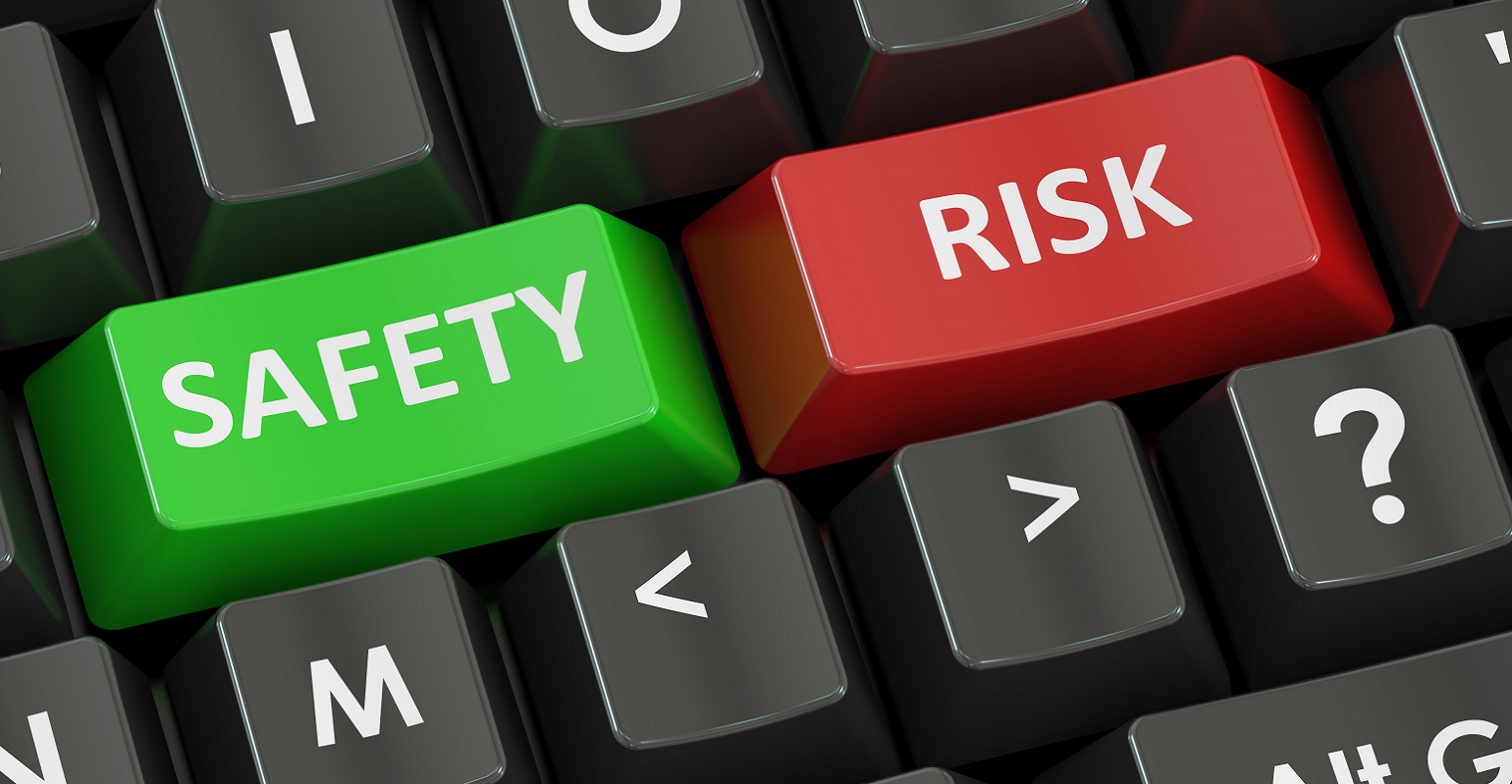 safety and risk concept on the black keyboard
