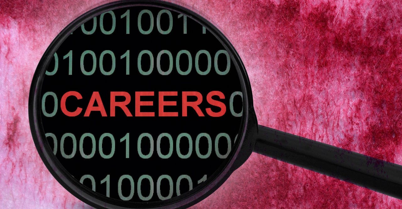 magnifying glass hovering over the word "Careers" with code magnifying glass hovering over the word "Careers" with code
