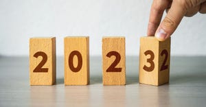 hand turning wood blocks to read 2023 hand turning wood blocks to read 2023