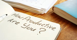 notepad with "how productive are you?" written on it notepad with "how productive are you?" written on it