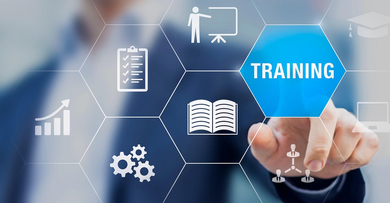 employee pressing training button employee pressing training button
