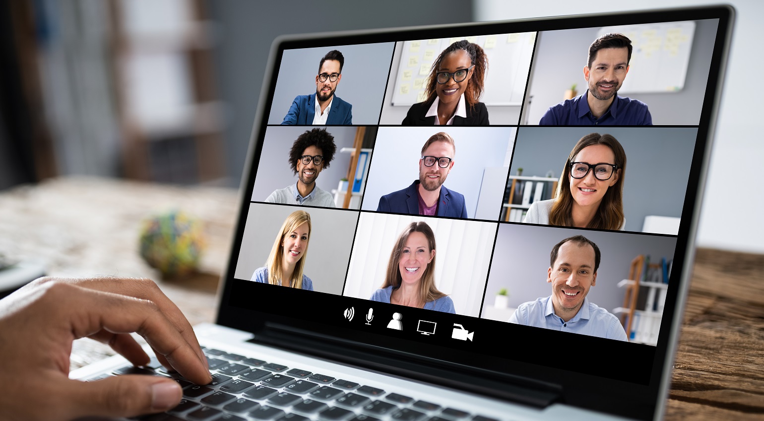 Laptop running online conferencing session